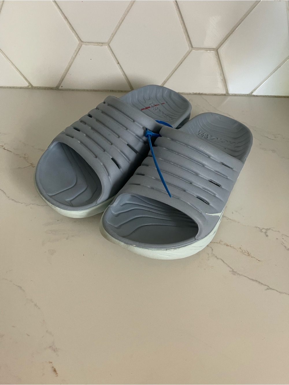 Hoka One One Slide Sandals in Light Gray with White Sole